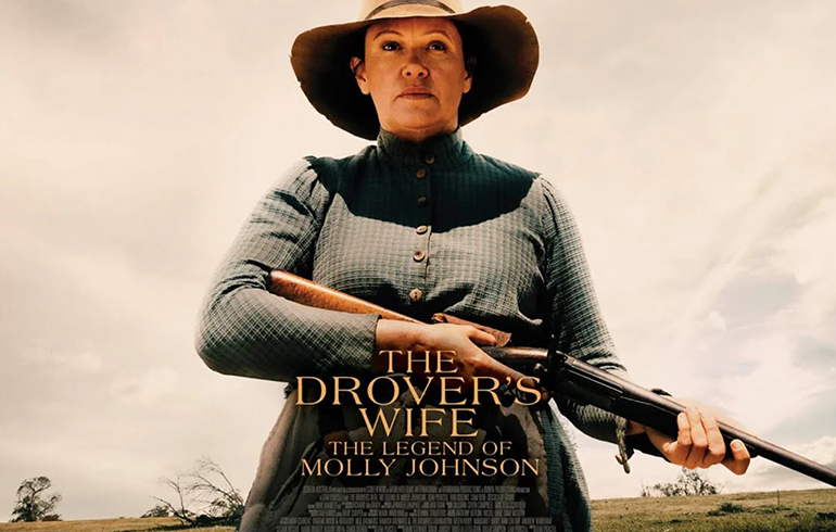 photo of a woman holding a rifle with the drover's wife as the text
